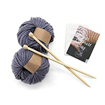 Knitting needles and a ball of yarn